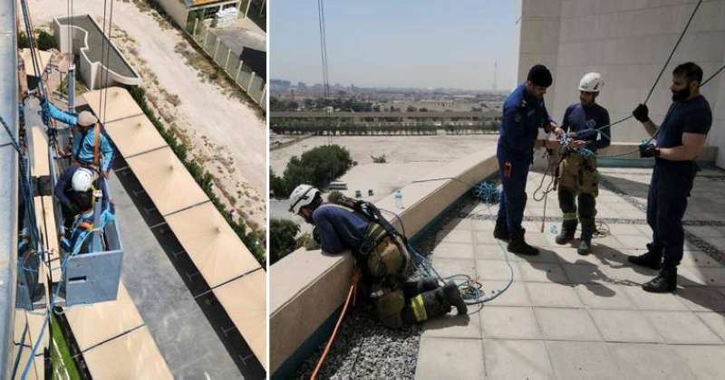 الإطفائيون خلال إنقاذ العمال