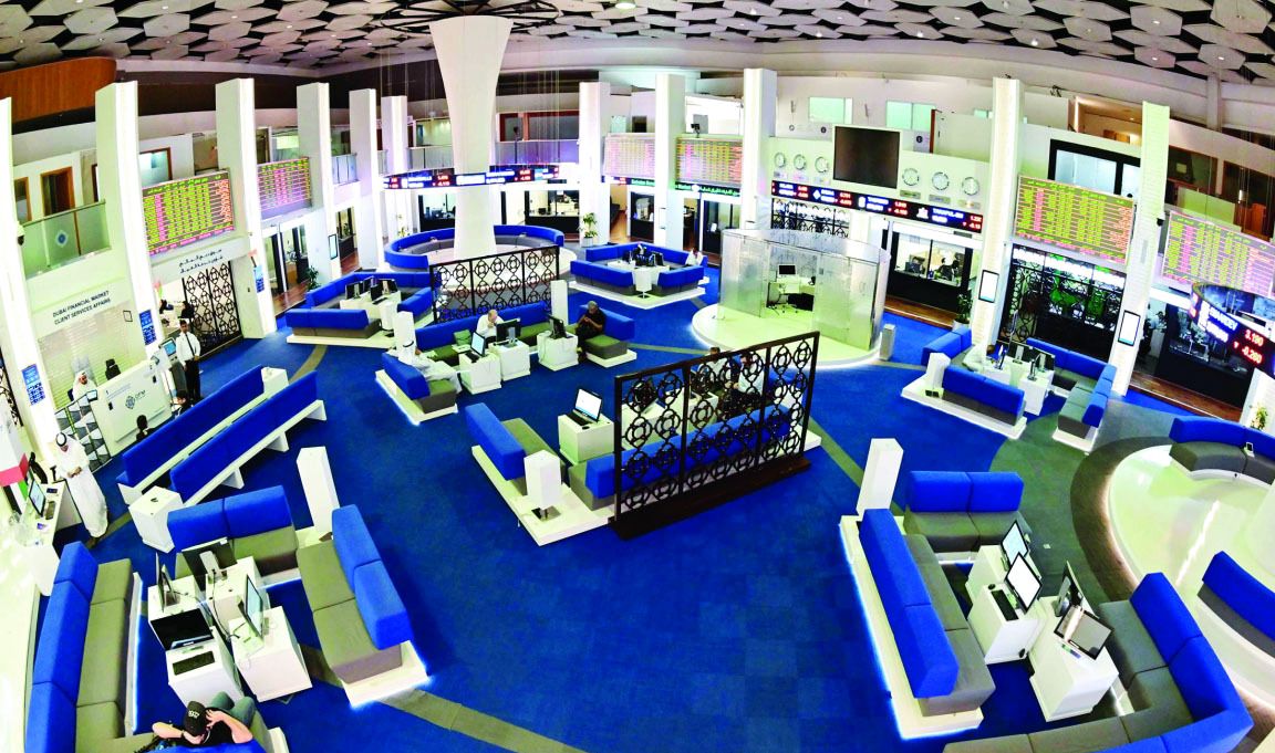 سوق دبي يواصل أداءه الإيجابي.. و«أبوظبي» يلامس 9700 نقطة