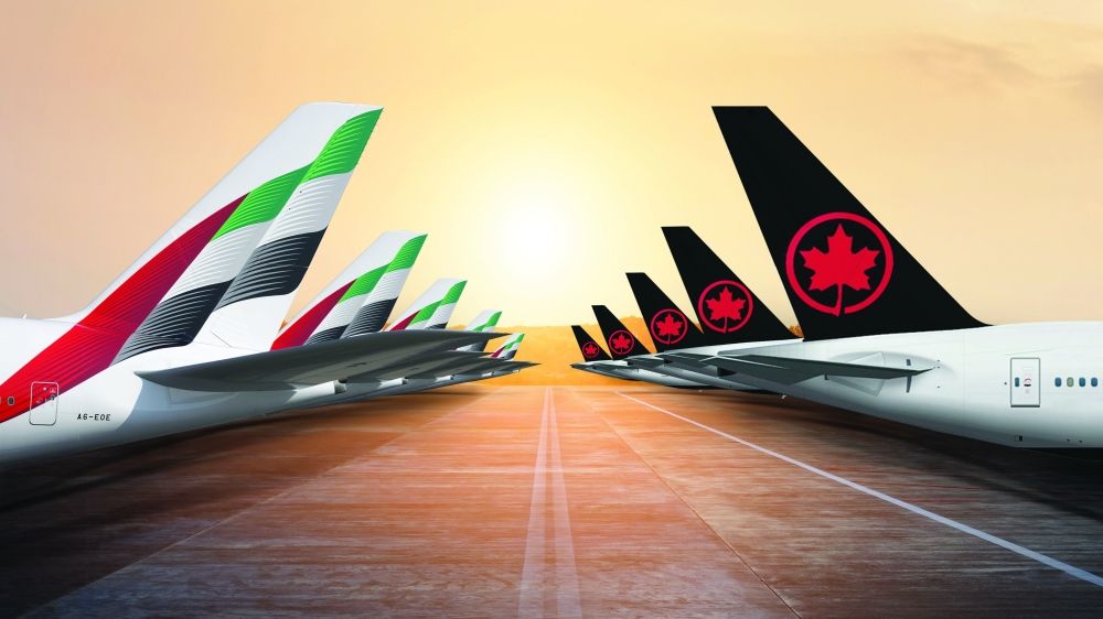 طيران الإمارات ترحب بـ«إير كندا» في المبنى 3 بمطار دبي