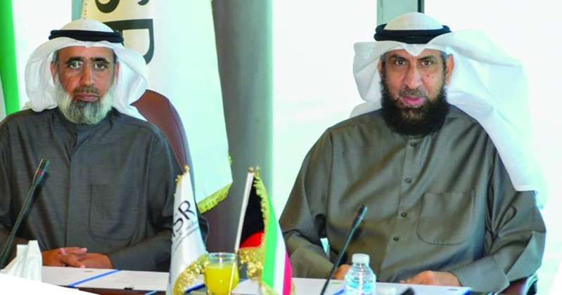 العتيبي والمطيري لدى توقيع المذكرة