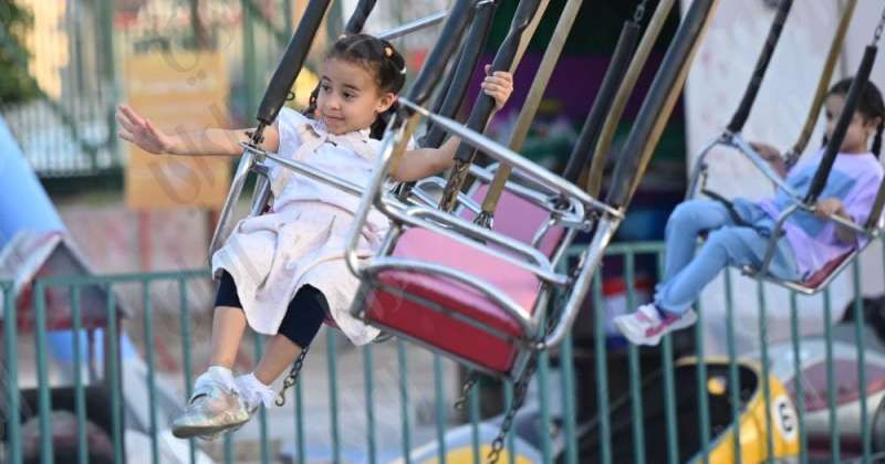 «الراي» تنشر صورا من أجواء ألعاب الأطفال والملاهي في العيد