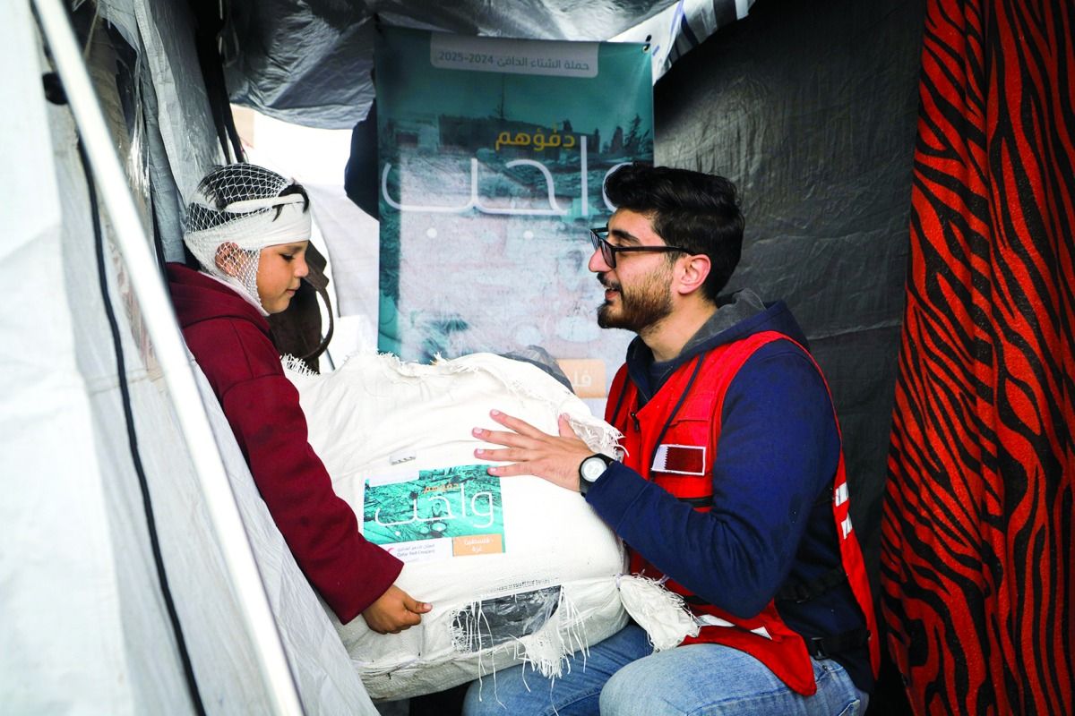 الهلال القطري يوفر الدفء للأسر الفقيرة والنازحة بعدة دول