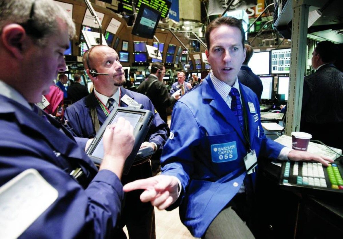 نتائج البنوك وأسهم شركات الرقائق تدعم «وول ستريت»