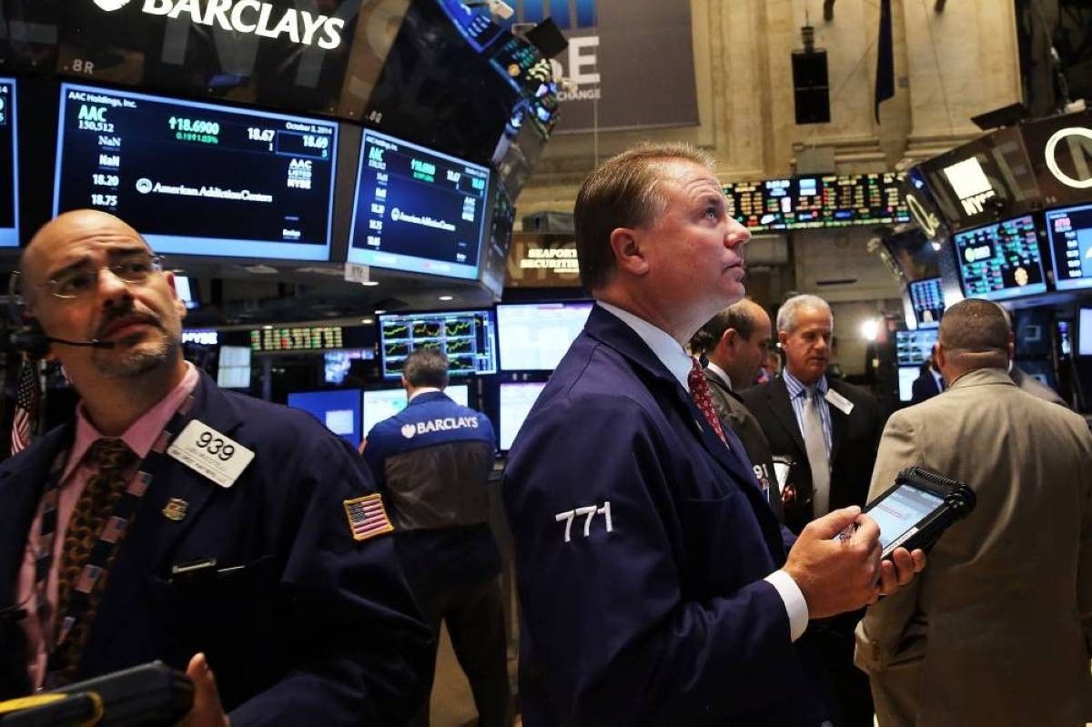 الترقب يخيم على «وول ستريت» في انتظار النتائج وقرار الفائدة